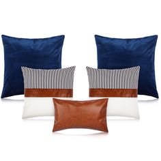 three pillows and two pillow cases in blue, white, and brown with leather accents