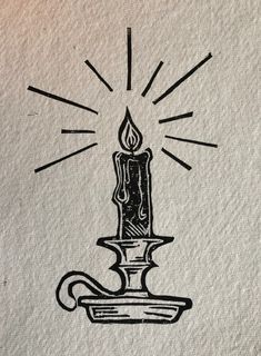 a drawing of a lit candle on top of a piece of paper with rays coming from it