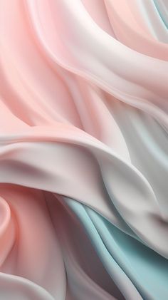 an abstract photo of pink, blue and white silk fabric with soft folds on it