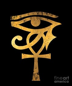 an ancient symbol with the eye of horush on it's side, in gold and black