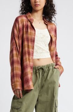 Perfect your '90s grunge aesthetic with an oversized, layer-ready button-up shirt made from lightweight plaid flannel. Front button closure Spread collar Long sleeves with button cuffs 55% cotton, 45% rayon Machine wash, tumble dry Imported Not available for sale and shipment to Germany Spring Flannel Tops With Button Closure, Spring Flannel Shirt With Relaxed Fit, Spring Relaxed Fit Flannel Shirt With Button Closure, Relaxed Fit Flannel Shirt With Button Closure For Spring, Oversized Flannel Shirt For Fall, Oversized Casual Flannel Shirt For Spring, Oversized Plaid Shirt For Fall, Oversized Flannel Button-up Tops, Oversized Flannel Spring Tops