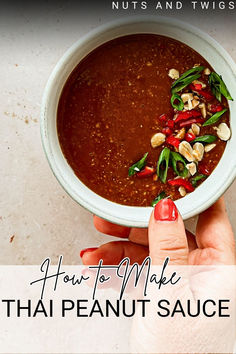 top view of hand putting down a bowl of sauce.