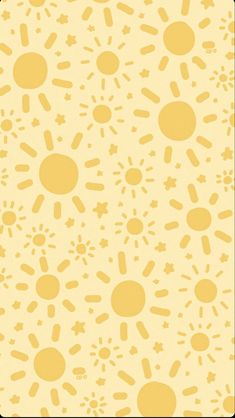 a yellow and white wallpaper with small sunflowers on it's side