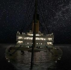 a large boat floating on top of the ocean under a night sky filled with stars