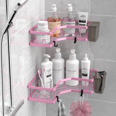 a pink shelf in the corner of a bathroom