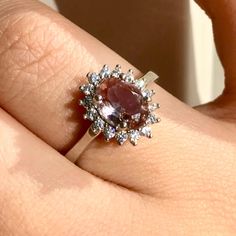 BUY 2 ITEMS GET 55% FOR WHOLE SHOP ( PROMO COD: SAVE55 ) BUY 300 $ GET 60 % FOR WHOLE SHOP ( PROMO CODE: SAVE60)  💍 Luxury Meets Magic 💍 This stunning 925 sterling silver ring features a mesmerizing color-changing diaspore (Zultanit) gemstone at its center, surrounded by a dazzling halo of moissanite stones. Diaspore stone changes color to pink or green depending on the light, either daylight (soft light) or dim light.  The diaspore's ability to change color based on lighting makes this ring a truly unique and captivating piece of jewelry, perfect for special occasions like engagement, anniversary, or a "just because" gift, this ring is a stunning way to express love and appreciation. The ring is 14,05 Carats, Dimensions of 10mmx12mm, Size:8-81/2  USA,(57-58) Europe. With a Nice Packing Dim Light, Gemstone Engagement Ring, Engagement Ring For Women, Handmade Jewel, Gemstone Engagement, Just Because Gifts, Gemstone Engagement Rings, Perfect Gift For Her, Ring For Women