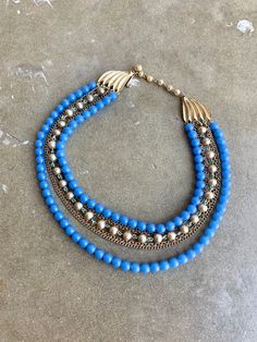 50's Vintage Blue Beads and chain Choker Necklace Condition: Good Vintage Condition, see photos Blue Beaded Necklaces In Costume Jewelry Style, Blue Beaded Chain Necklace Costume Jewelry, Blue Beaded Chain Necklace In Costume Jewelry Style, Vintage Multi-strand Beaded Chain Necklaces, Blue Double Strand Necklaces For Party, Turquoise Beaded Chain For Party, Blue Double Strand Necklace For Party, Retro Blue Jewelry For Party, Elegant Blue Beaded Necklaces With Chain