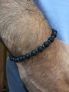 Check out Men&#39;s Beaded Bracelet, Mens Bracelets, Black Lava Stone Bracelet, Mens Jewelry, Adjustable Black Lava Rocks Bracelet, Bracelets for men. on mariacruz Male Bracelets, Leather Bracelet Tutorial, Men Stone Bracelet, Mens Bracelet Set, Mens Accessories Bracelet, Bracelets Black, Lava Rock Bracelet