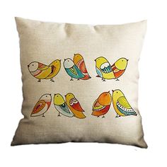 a pillow with birds painted on it