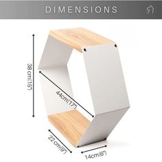 a white and wood shelf with measurements for it