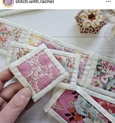 someone is stitching squares on top of each other to make them look like they are made out of fabric