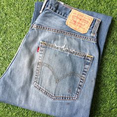 Size 31 Vintage Distressed Levi's 569 Dirty Ripped Jeans W31 L30 Light Wash Denim Loose Fit Straight Leg Jeans Mom Jeans Boyfriend Jeans Made In Mexico Waist 31" Brand: Levi's 569 Size On Tag: W32 L32  but fits more like: W31, approximately US 10 12 Waist 31" Rise 12.5" Thighs 28" Hips 50" Inseam 30.5" Length 42" Leg opening 20" All measurements are taken with the garment laying flat & doubled. Measurement in inches. We recommend giving yourself an extra few inches for ease of fit CONDITIONS: Di Levis 569, Two Horses, Western Jeans, Vintage Levis Jeans, Jeans Mom, Tall Jeans, Stylish Mens Outfits, Vintage Harley Davidson, Womens Jeans