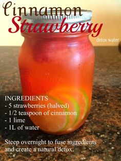 a jar filled with liquid sitting on top of a counter