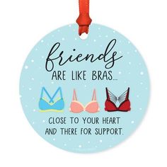 friends are like bras ornament hanging from a red ribbon on a blue background