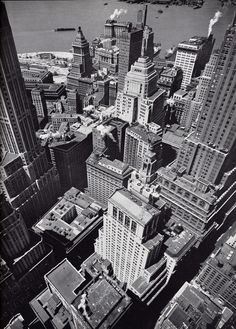 black and white photograph of new york city from the top of empire building looking down