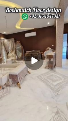 a large room with white marble floors and walls