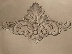 a drawing of an ornate design on the wall