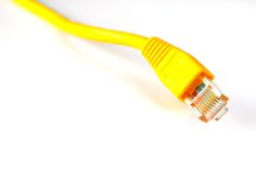 a yellow cat5e patch cord with an orange end