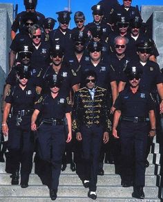 a group of police officers posing for a photo