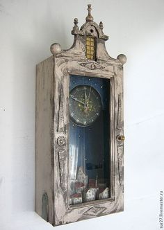 an old clock is hanging on the wall