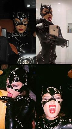 two women dressed up as batman and catwoman, one with her mouth open while the other is holding a cell phone