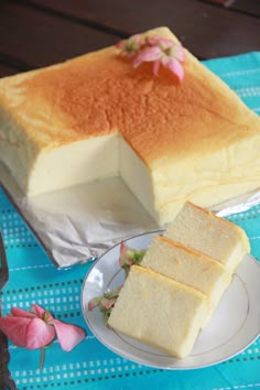 two slices of cake sitting on top of a white plate