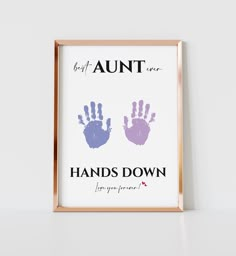 two hand prints on a white wall with the words,'best aunt ones hands down for you forever '