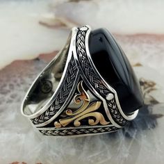 The ring is made of 925 sterling silver, decorated with stunning black onyx stone. PRODUCT FEATURES -Products are shipped with free shipping along with the box and bag. - Production Mine: 925 Sterling Silver - Weight: 16,5 grams - Stone: Black Onyx -Stone size: 18x25 mm All products come in a special gift box. If you don't see your size, please ask, we can produce your size. You are looking at high quality handcrafted silver ring. All our products are designed and produced by ourselves. Your fee Handmade Onyx Jewelry, Wax Carving Jewelry, Onyx Ring Men, Islamic Jewelry, Mens Rings Fashion, Black Gems, Sterling Silver Mens Rings, Ring Men, Black Onyx Stone