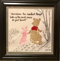 winnie the pooh and piglet handprinted on paper in a shadow frame