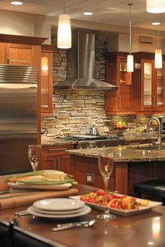 a kitchen with wooden cabinets and stainless steel appliances