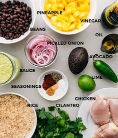 the ingredients to make an enchilada recipe laid out on a white surface