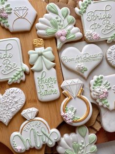 some decorated cookies are laying on a table