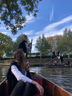 two people in a boat on the water