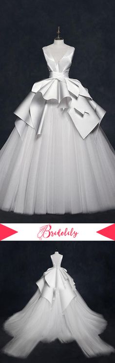 the dress is designed to look like it has been made out of tulle and ribbon