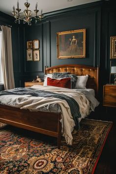 a bedroom with black walls and an antique bed in the middle, along with a rug on the floor