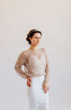 Mohair Silk Sweater. Bridal Sweater. Mohair silk sweater pillover is part of the women's wardrobe which complements and preserves the femininity and uniqueness of your festive or wedding look. This is a truly versatile sweater model for any season. The bottom hem of the sweater is made with a special elastic band for your comfort and this creates a magical decorative effect.  Sweater made with mohair silk blend yarn. In the photo color - 20 - beige. Model height 175 cm / 68.90 " and is wearing s Elegant Mohair Crew Neck Sweater, Elegant Mohair Sweater For Fall, Chic Mohair Long Sleeve Sweater, Chic Long Sleeve Mohair Sweater, Winter Wedding Mohair Sweater, Beige Mohair Long Sleeve Sweater, Beige Mohair Sweater, Fitted Mohair Sweater For Layering, Bride Sweater