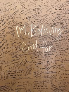 a wall with writing on it that says i'm believing god for