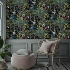 a chair and ottoman in front of a wallpapered room with plants on it