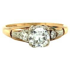 an antique three stone diamond ring