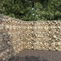 a stone wall is built into the ground