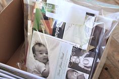 an open box with baby items in it