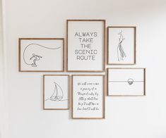 there are many framed pictures on the wall with words and drawings above them that say, always take the scenic route