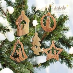 wooden ornaments hanging from a christmas tree