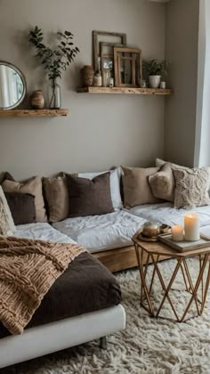 a living room filled with lots of furniture and decor on top of a white rug