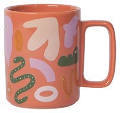 an orange coffee mug with animals on it