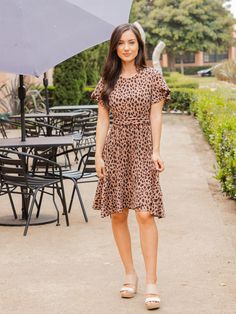 Say hello to our must-have dress of the season - the Patterned Belted Waist Tulip Sleeve Katie Dress! This stylish and comfortable dress is a wardrobe essential for any fashionista. With playful patterns that are sure to make a statement, this dress is perfect for any occasion. Size: Small 0-4 Medium 6-8 Large 10-12 XL 12-14 Casual Fit And Flare Midi Dress For Fall, Trendy Brown Knee-length Dress, Trendy Brown Dress For Day Out, Casual Fit And Flare Dress For Brunch, Casual Fit And Flare Midi Dress For Day Out, Casual Fit And Flare Knee-length Dresses, Casual Fit And Flare Midi Dress, Fit And Flare Midi Dress For Day Out, Casual Fit And Flare Mid-length Dresses