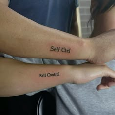 two people with matching tattoos on their arms that say self control and self control in black ink