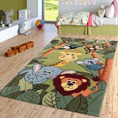 PRICES MAY VARY. SIZE: 48 x 48 inches | COLOR: Green / Multicolor COMPOSITION: Machine Made / 100% Polypropylene / Backing: Jute / Pile-Height: 0.47'' / The Power Loomed construction adds durability to this Rug HIGHLIGHTS: Cute and Charming Jungle Animal Motifs / kid and pet friendly / soft & robust / Suitable for Underfloor heating Free from harmful Substances - This Product is certified according to Oeko-Tex Standard 100 Easy to clean - we recommend spot cleaning with a mild detergent and regu Jungle Rug, Rug For Nursery, Kids Rug, Childrens Rugs, Nursery Rugs, Underfloor Heating, Jungle Animals, Green Rug, Wall Color