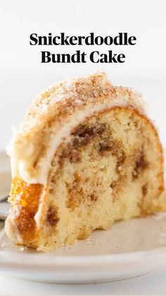 a piece of cake sitting on top of a white plate with a fork next to it