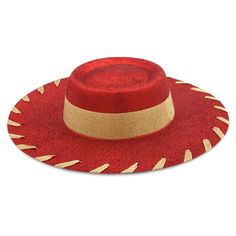 a red hat with gold trim is shown on a white background and it's not too bright